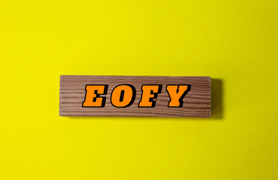 eofy word on Wood Background