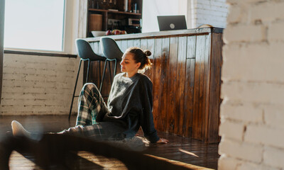 Slow Living at Home: Relaxed Woman Enjoying a Peaceful Moment