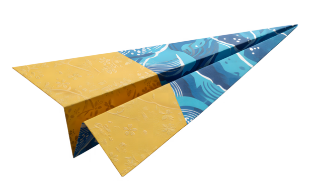 Handmade origami paper plane featuring blue wave and yellow floral patterns flying isolated on a transparent background - Powered by Adobe