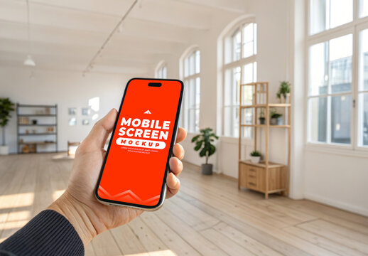 Indoor Handheld Smartphone Mockup Featuring Natural Grip and Realistic Ambient Lighting