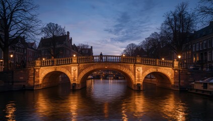Obraz premium Lit bridge above Brouwersgracht at dusk, Amsterdam, Netherlands, Europe