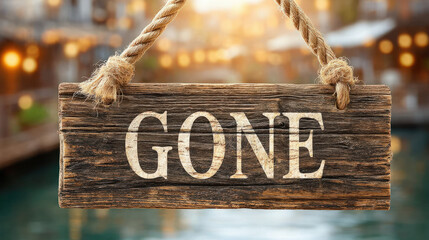 A simple gone fishing sign on a lake