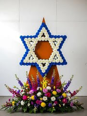 A large blue and white star shaped floral arrangement on a wooden stand