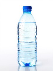 Naklejka premium Clear plastic water bottle with blue cap isolated on white background