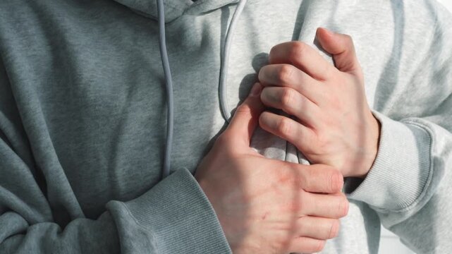A man with a heart condition.
A man is having a heart attack.
Chest pain due to fatigue and overwork.