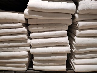 A folded bedsheet set, neatly stacked