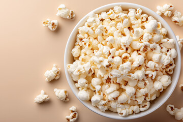 Popcorn in a bowl as food for a sports night or movie night. Top view with space for text.