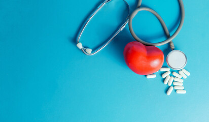 Heart Health and World Heart Day Concept Cardiovascular car, stethoscope and medicine