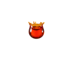 A splash of amber liquid forms a crown shape, showcasing dynamic movement and a vibrant color against a dark backdrop.