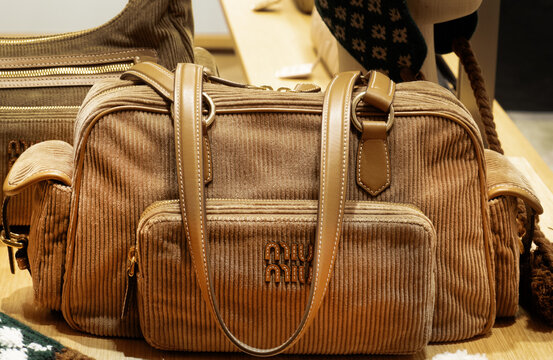brown pocket  corduroy shoulder bag by Miu Miu.Milan - Italy,24 December 2025