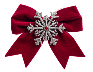 A velvet red bow with a snowflake center on a transparent background