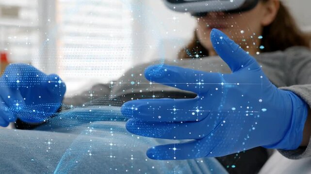 A woman wearing a virtual reality headset with blue gloves, engaged in a futuristic immersive experience inside a bright room