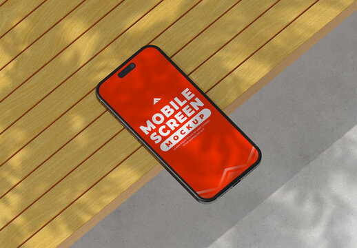 Mobile Screen Mockup on Wooden Floor