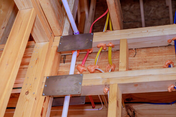 Construction work electrical wiring, plumbing installation in building project in residential area