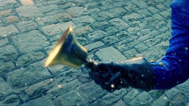 Christmas Scene Of Traditional Bell Ringer In Snowfall