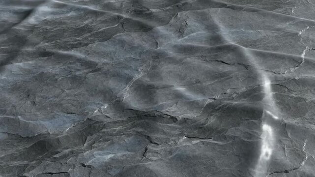 Abstract animated seamless loop of rippling monochromatic slate texture flowing slowly across the stone surface background conceptual, visual, website
