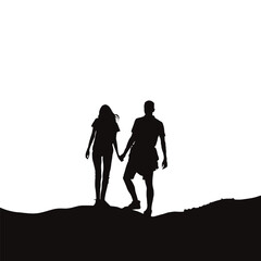 Silhouette of a couple holding hands while standing on a hill against a