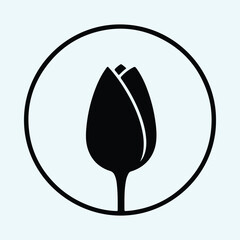 Silhouette single tulip flower icon inside a circle vector illustration