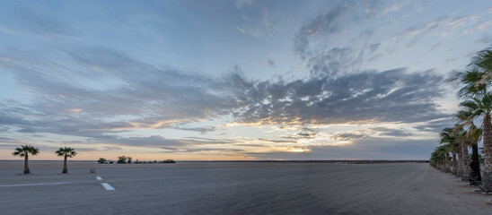 high clouds over pan at sunset, Bitterwasser, Namibia