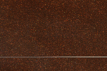 gold Sparkling Lights Festive background with texture. Abstract Christmas twinkled bright bokeh...