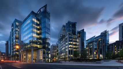 Modern Urban Skyscrapers at Dusk with Illuminated Windows in a Bustling Cityscape Offering a Futuristic Architectural Panorama