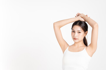 Portrait beautiful asian woman with raised arms showing smooth underarms, beauty skincare and body care concept.