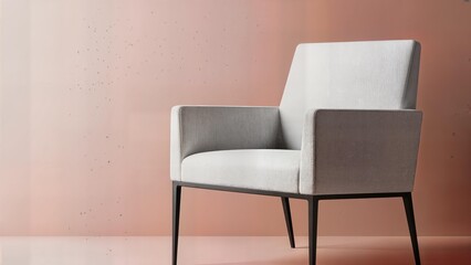 Modern armchair standing against soft pink wall in room