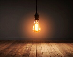 Glowing light bulb hanging in dark room emitting warm orange illumination