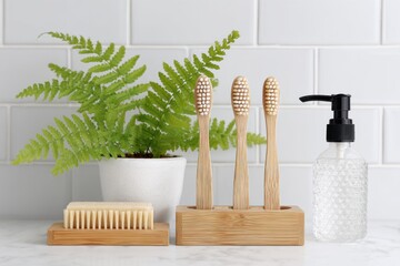 Eco friendly bathroom essentials bamboo toothbrushes and natural soap