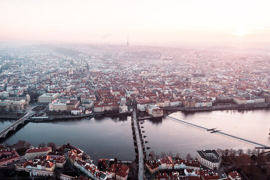 Prague Old Town, Charles Bridge, and Red Rooftops at Golden Hour Sunrise &ndash; Aerial View