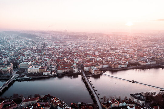 Prague Old Town, Charles Bridge, and Red Rooftops at Golden Hour Sunrise &ndash; Aerial View
