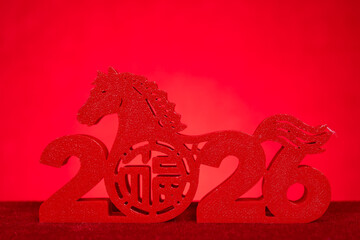 plastic Chinese New Year of Horse mascot on red no logo no trademark