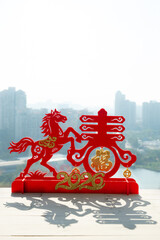 Chinese New Year of Horse 2026 mascot with shadow at vertical composition translation of the Chinese words are fortune and springtime no logo no trademark