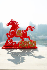 Chinese New Year of Horse 2026 mascot with shadow at horizontal composition translation of the Chinese word is fortune no logo no trademark