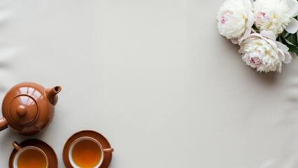 Minimal Qingming festival background with warm tea ceremony copyspace background and floral accent. Calm spring design background with space for text