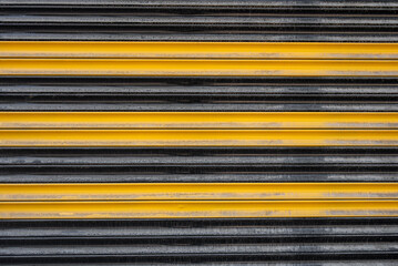 Black And Yellow Metal Shop Shutter Background Texture