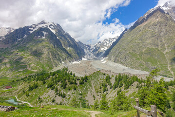 high mountain landscape above Lake Combal in the Aosta Valley in July 