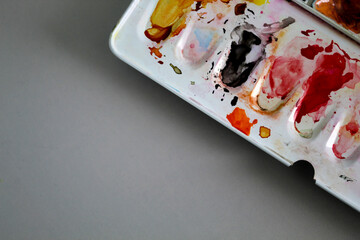 Watercolor Artist Palette with Colorful Paint Stains