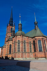 Obraz premium Exterior of Riddarholmen Church, the church of the former medieval Greyfriars Monastery in Stockholm, Sweden. The church serves as the final resting place of most Swedish monarchs