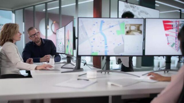 Engineers Using GIS Software To Inspect Construction Project Valuation