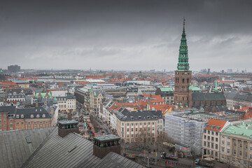 Obraz premium Church of Our Saviour spire above Copenhagen rooftops