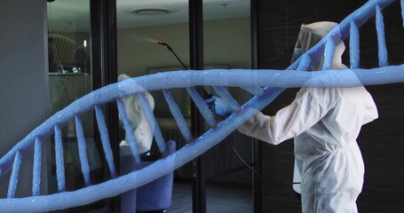 Spraying worker in white coverall holding spray wand and DNA graphic near glass door, copy space