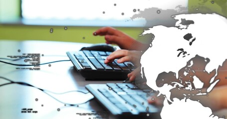 Typing two pairs of hands pressing keys at office desk, showing wired keyboards, globe graphic