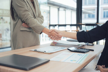 Deal Sealed: A professional handshake seals a business agreement, symbolizing trust, collaboration, and a successful partnership.