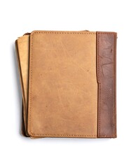 Fototapeta premium Tan leather bound notebook stack