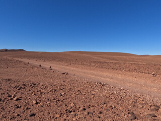 Dirt Road Through Desert Landscape