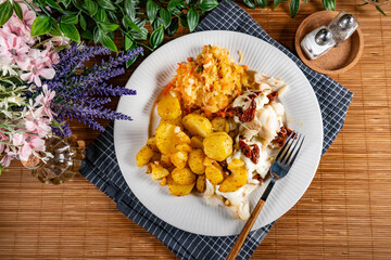 Baked pieces of cod.