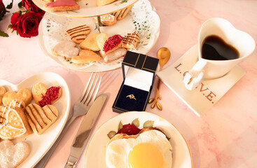 valentines  wedding  proposal  romantic  breakfast  with hear shaped  food  and  a  ring 