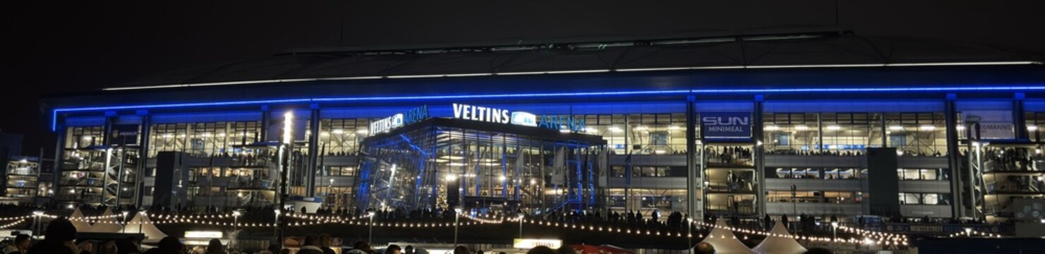 Gelsenkirchen, Germany - November 28, 2025: Veltins Arena exterior view at night on Bundesliga game day