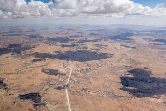 Goma Aib river and little village in barren countryside, Kobos, Namibia